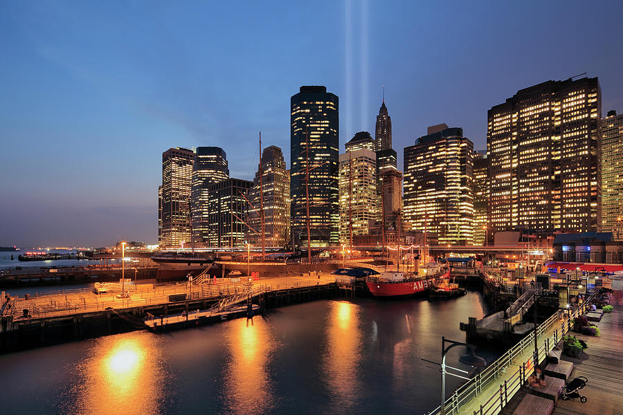 New York City, Manhattan, Lower Manhattan, World Trade Center, Financial District Skyline At Night With The 9/11 Memorial Lights Display, View Form South Street Seaport Digital Art by Riccardo Spila