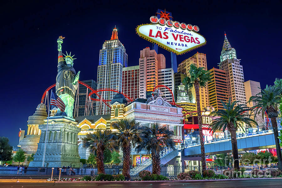 New York New York Casino at Dusk Low Angle Golden Knights With Welcome to Las Vegas Sign Photograph by Aloha Art