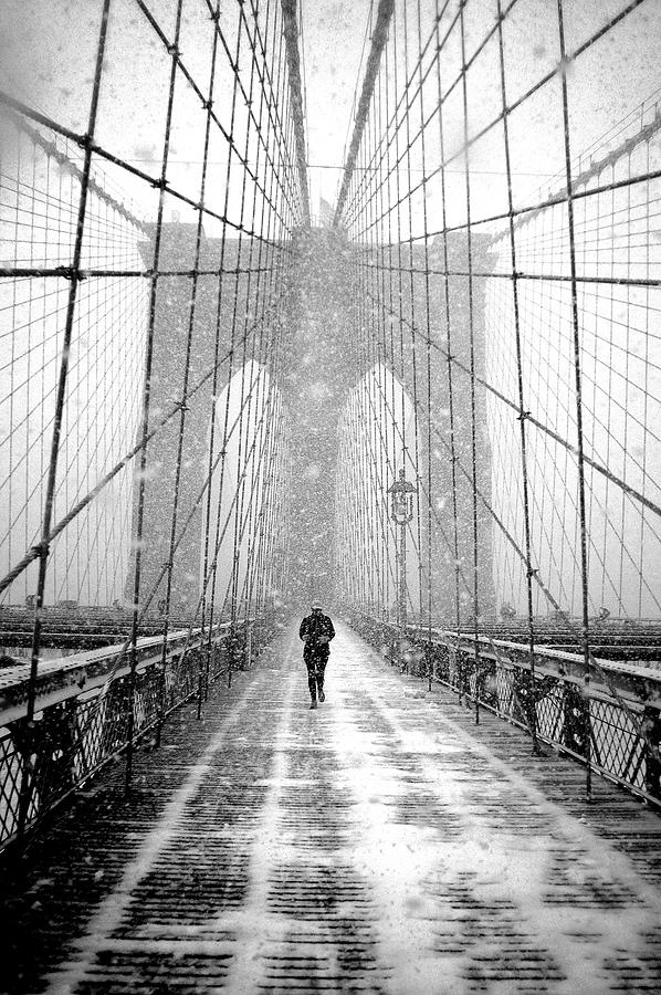 Architecture Photograph - New York Walker In Blizzard - Brooklyn Bridge by Martin Froyda