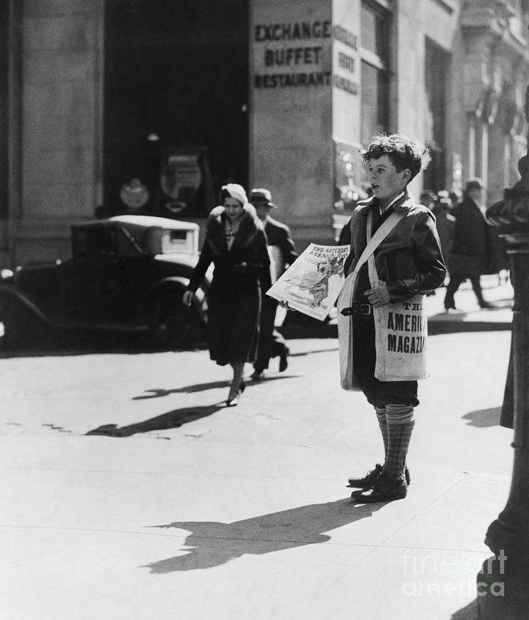 Newsboy Selling Saturday Evening Post Photograph by Bettmann