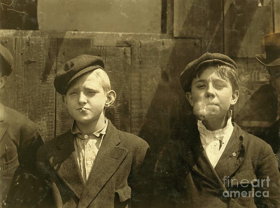 Newsboys Having A Cigarette Break, St. Louis, Missouri. 1910 Photograph by Lewis Wickes Hine