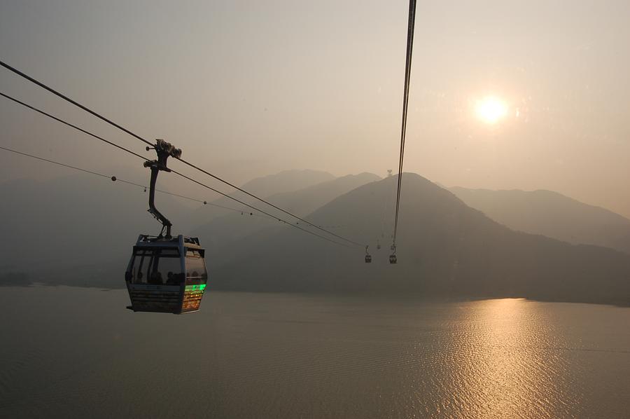 Ngong Ping 360 Cable Car In The Evening Photograph by Jerry Weng