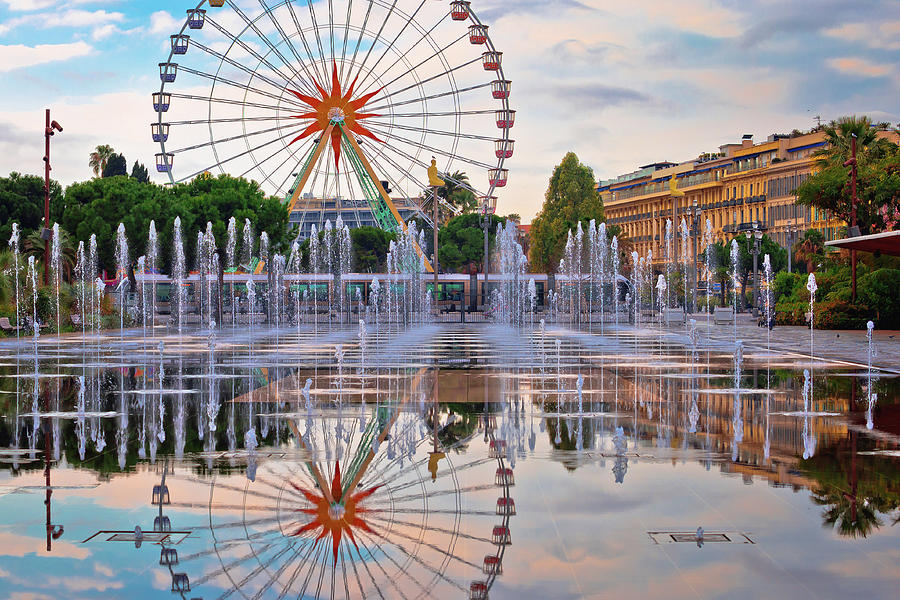 Nice Ferris Wheel And Cityscape Fountain Mirror View Photograph