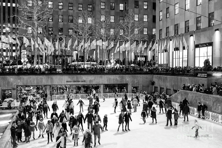 Night Skating at Rockefeller Center Photograph by John Rizzuto