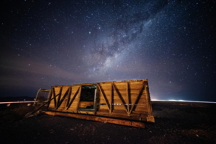 Night Sky at an abandoned railway wagon in Atacama Desert Chile Photograph by Kamran Ali