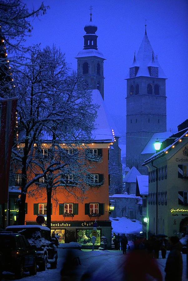 Night Time In Kitzbuhel, Austria Photograph by Walter Bibikow