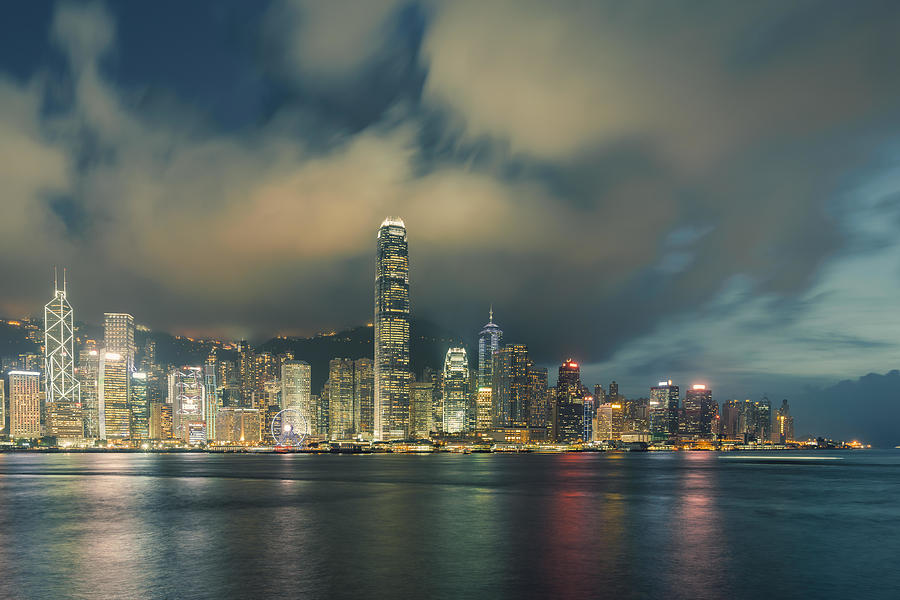 Architecture Photograph - Night View Of Victoria Harbour In Hong by Prasit Rodphan