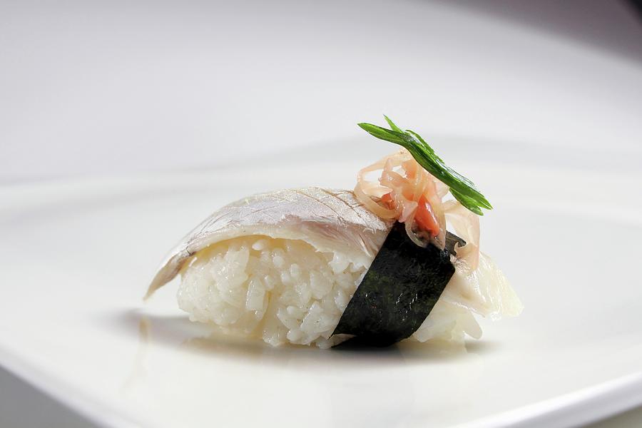 Nigiri Sushi With Fish, Nori And Ginger Photograph by Jan Prerovsky