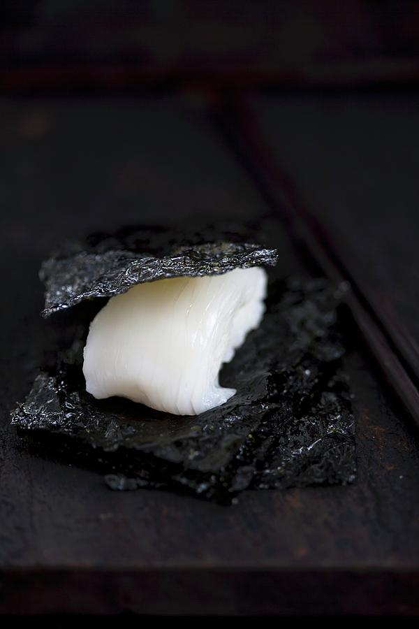 Nigiri Sushi With Squid tai Between Pieces Of Salty Nori japan Photograph by Martina Schindler
