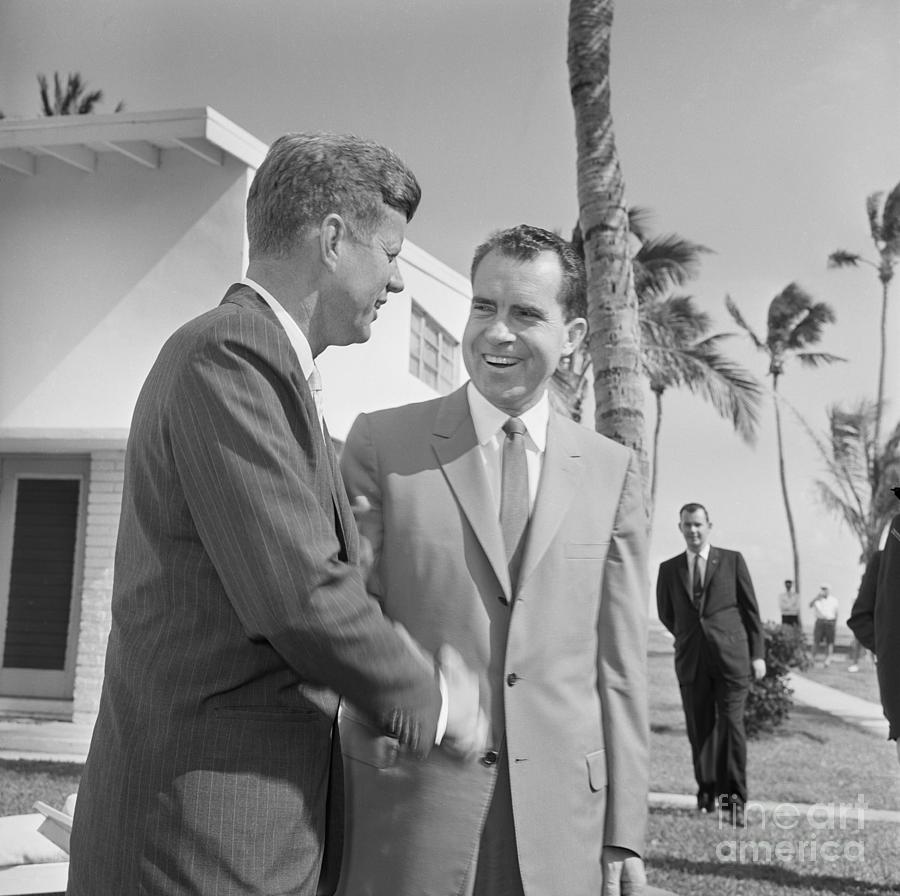 Nixon And Kennedy Shaking Hands Photograph by Bettmann