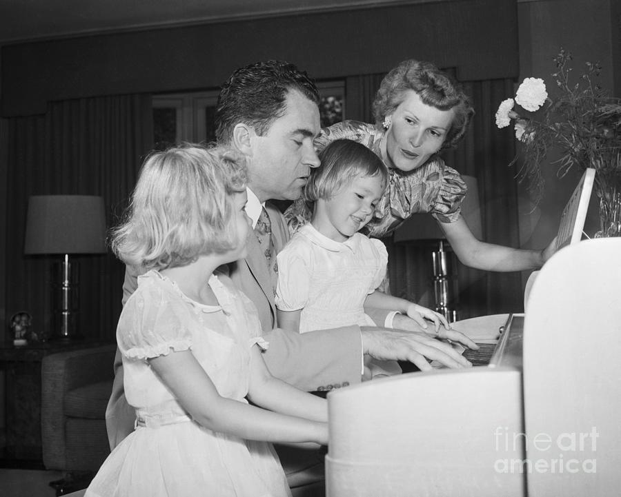 Nixon Family Singing And Playing Piano Photograph by Bettmann