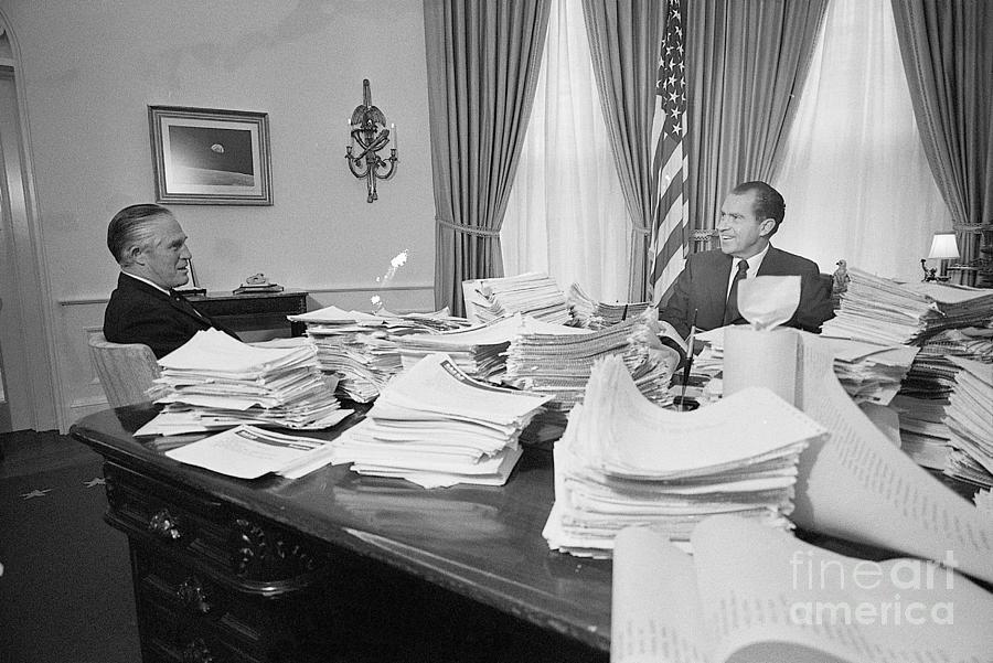 Nixon With Piles Of Papers Photograph by Bettmann