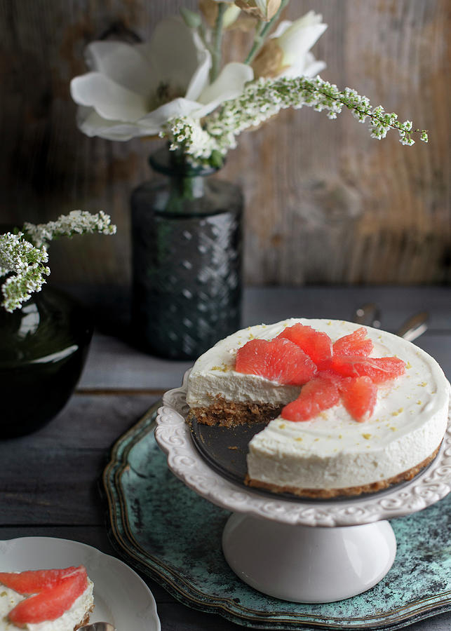 No Bake Cheesecake With Pink Grapefruit On A Cake Stand Photograph by Myriam Meliani