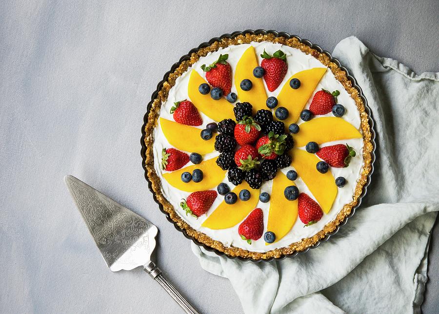 No-bake Yoghurt Tart With Fresh Berries And Mango Photograph by Lisa Rees