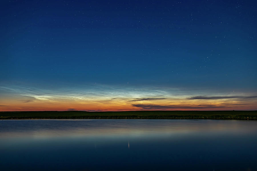 Noctilucent Clouds And Capella Star Low Photograph by Alan Dyer