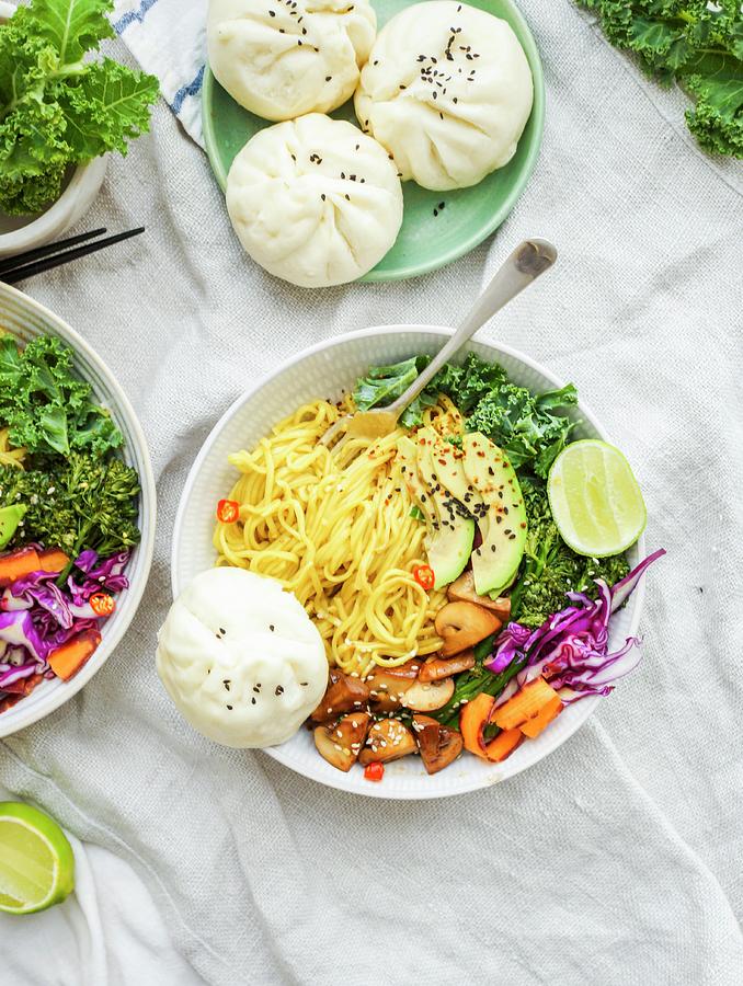 Noodle Bowl With Vegetables And Chinese Vegan Dumplings Photograph by Velsberg