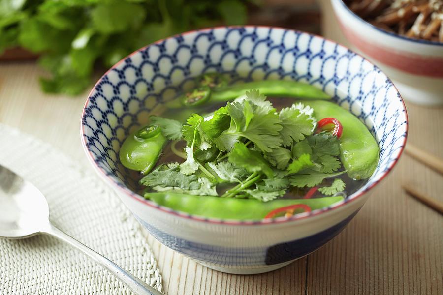 Noodle Soup With Mange Tout And Coriander Leaves asia Photograph by Debby Lewis-harrison