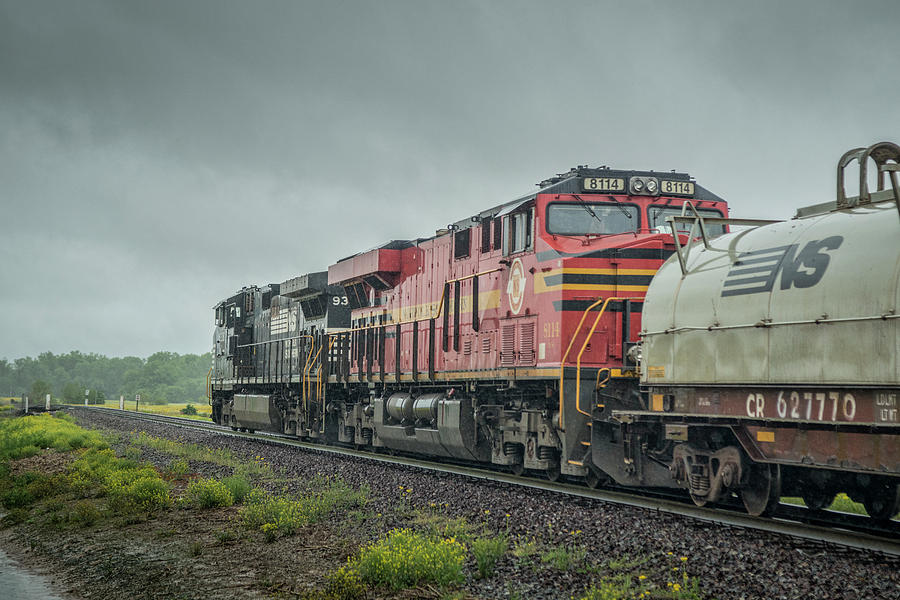 Norfolk Southern Heritage Unit 8114 trails behind NS 9318, on 60A, as it heads toward Huntingburg IN Photograph by Jim Pearson
