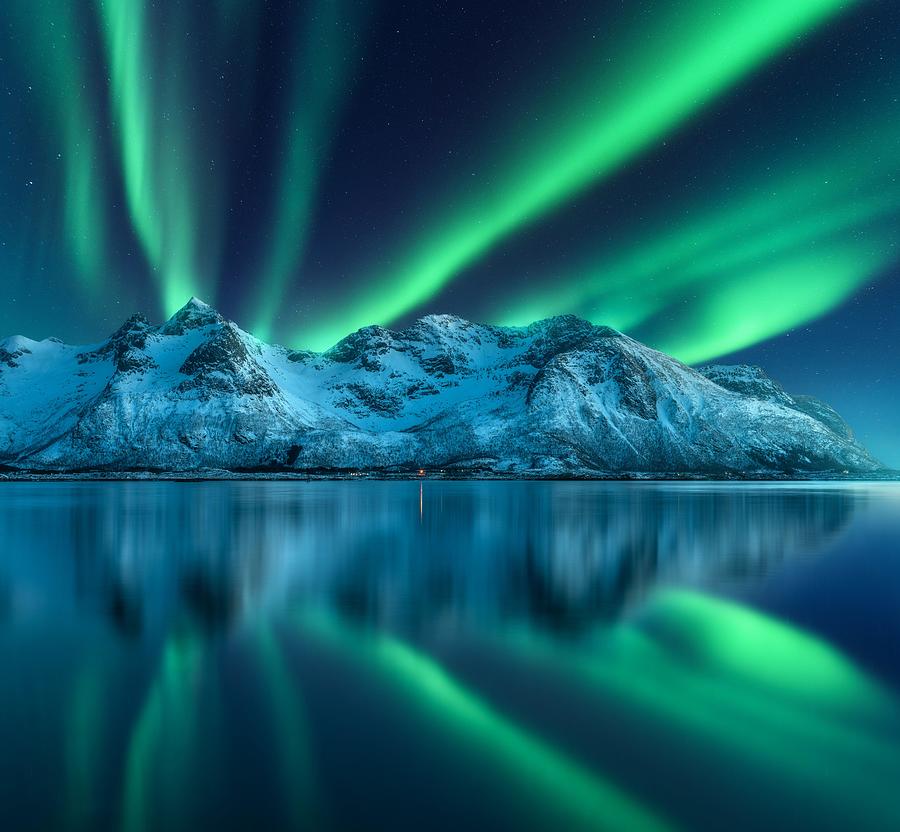 Landscape Photograph - Northern Lights Over The Mountain, Sea by Denys Bilytskyi