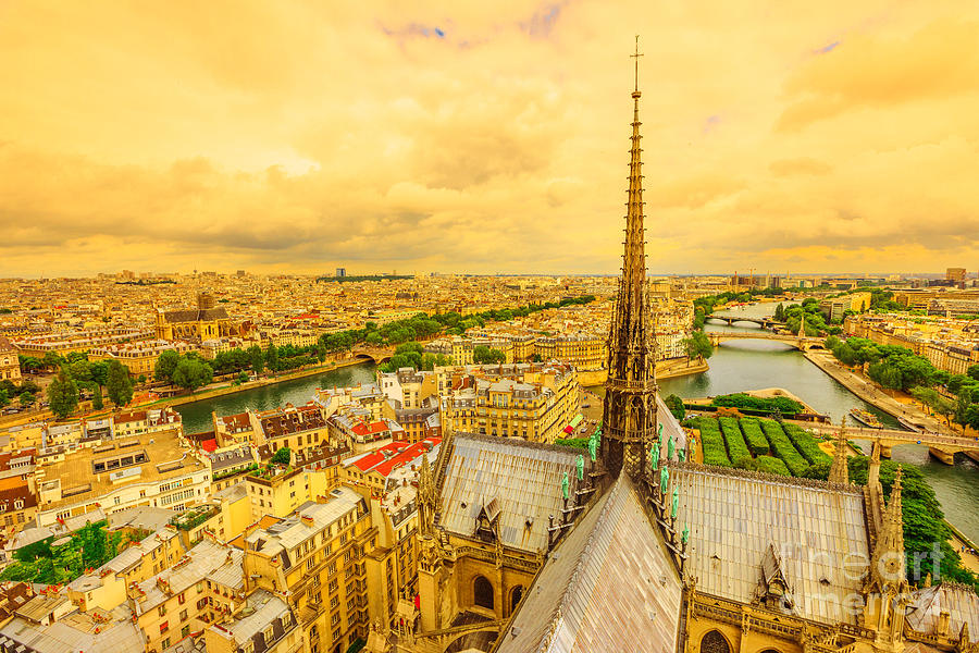 Notre Dame spire sunset panorama Photograph by Benny Marty