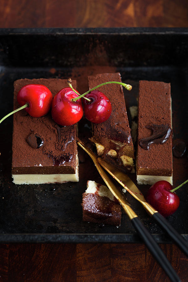 Nougat Slices Garnished With Cherries Photograph by Katrin Winner