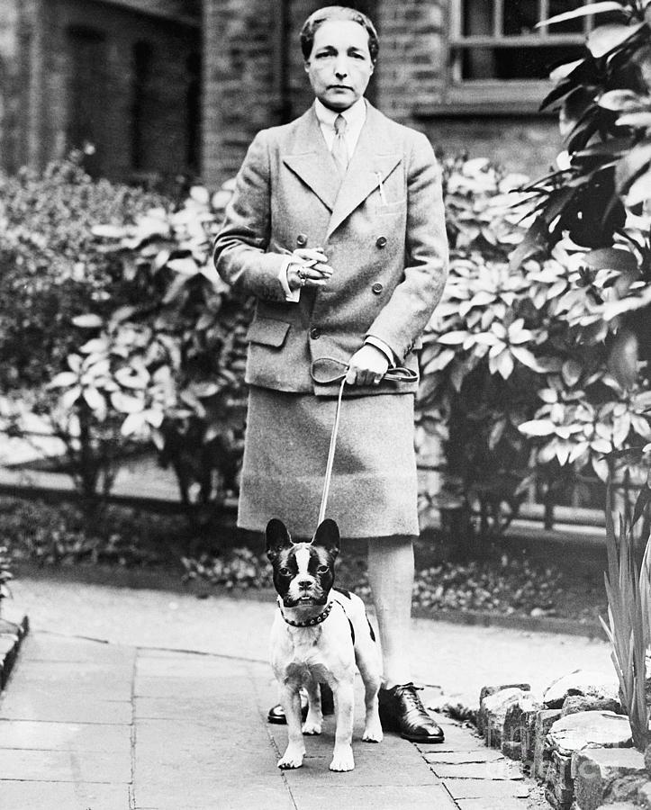 Novelist Radclyffe Hall With Her Pet Dog Photograph by Bettmann