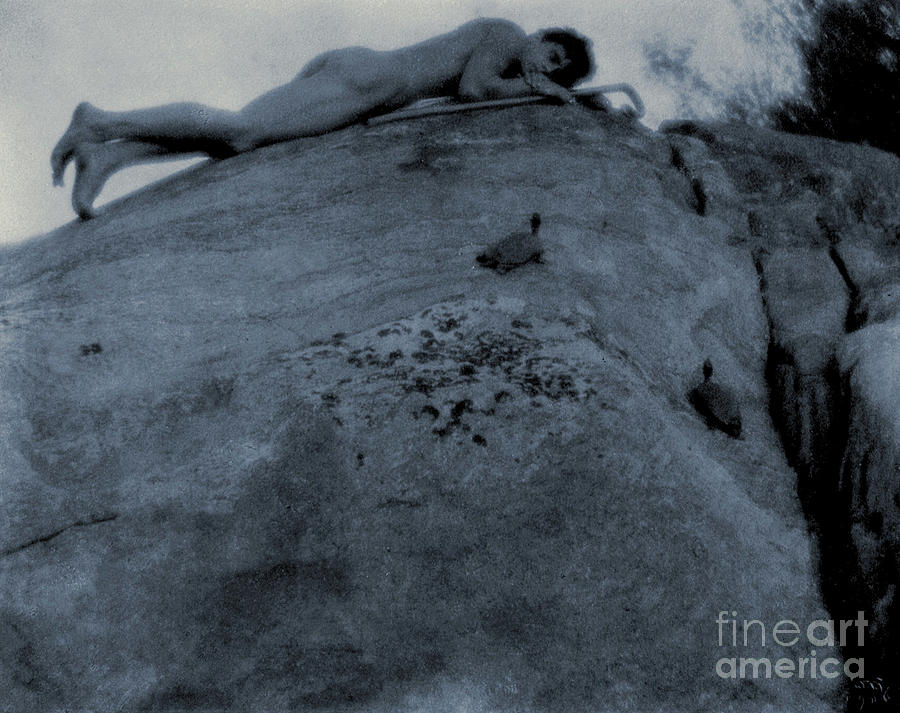 Nude young man on rocks with tortoise and shepherds staff Photograph by Frederick Holland Day