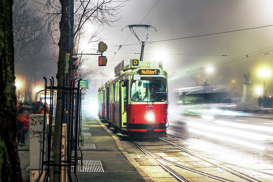 Nudorf Tram at Night in Vienna Photograph by John Rizzuto