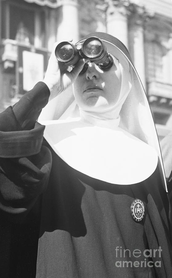 Nun Looking Through Binoculars Photograph by Bettmann