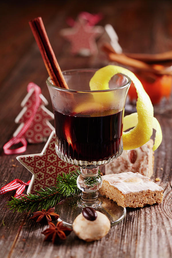 Nuremberg Christkindl Mulled Wine With Red Wine, Lemon, Star Anise And Cinnamon For Christmas Photograph by Teubner Foodfoto