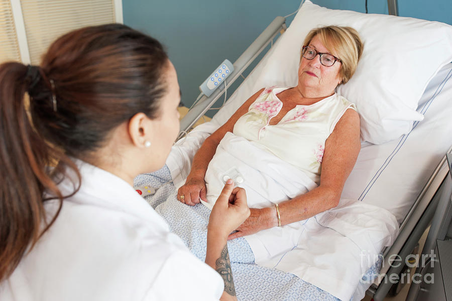 Nurse Giving A Patient Medication Photograph By Arno Massee Science