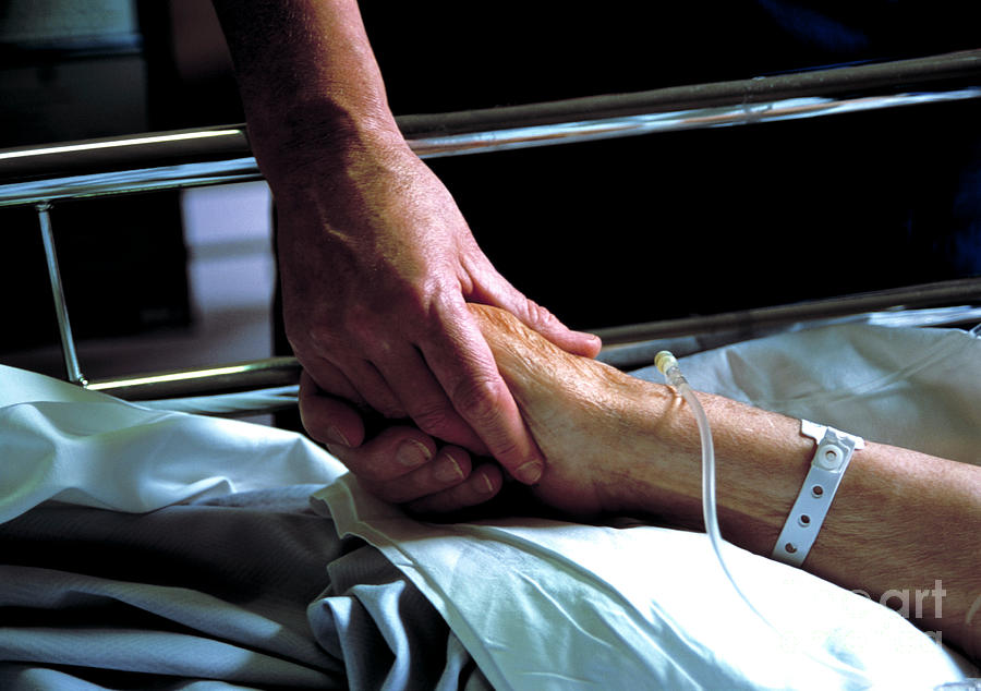 Nurse Holds Patients Hand Photograph by John Cole/science Photo Library