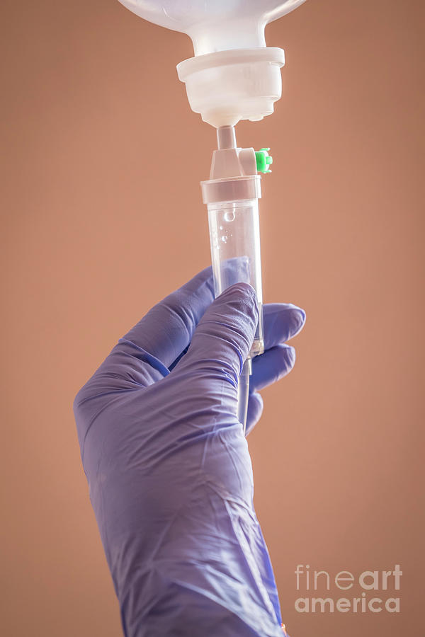 Nurse Managing Fluid With A Dropper Photograph by Science Photo Library Nurse Managing Fluid With A Dropper Photograph by Science Photo Library