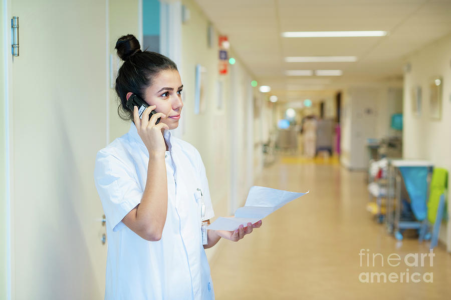 Nurse Talking On The Phone Photograph By Arno Massee Science Photo