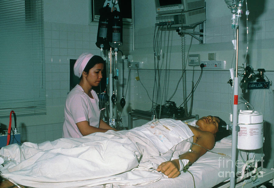 Nurse Watches Malaria Patient In Intensive Care Photograph by Sue Ford ...