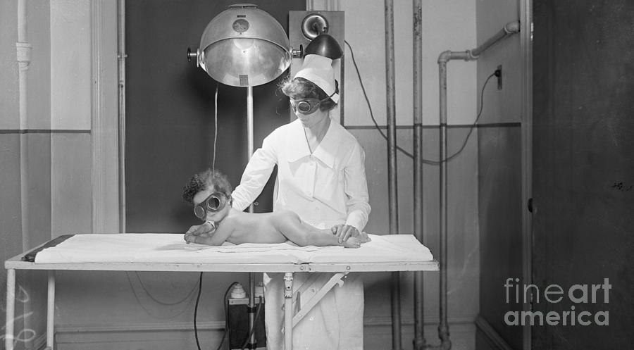 Nurse With Apparatuses By Table Photograph by Bettmann