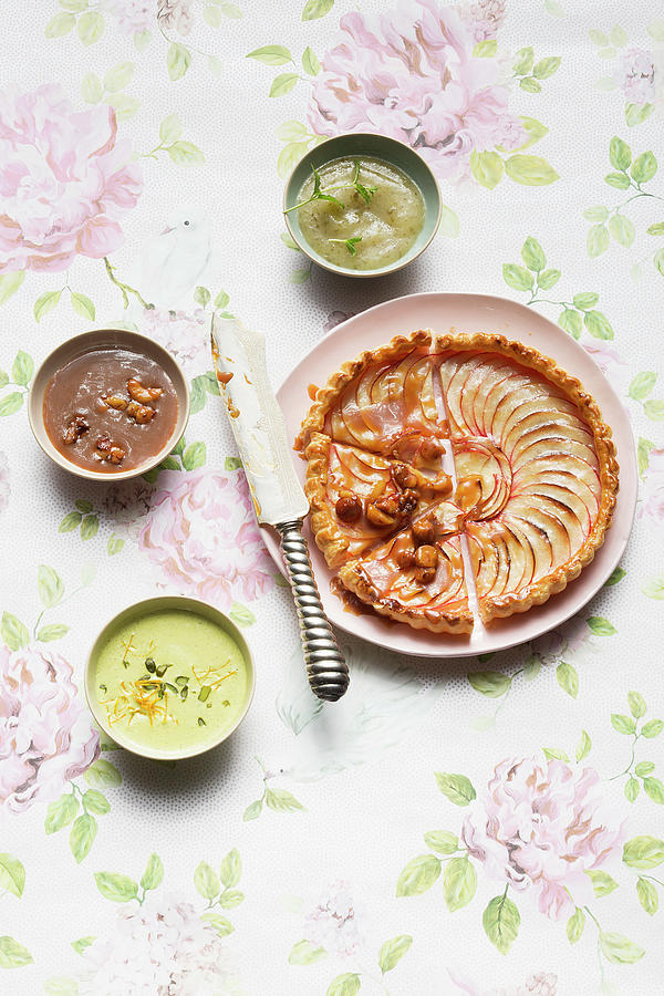 Nut And Caramel Sauce, Vanilla And Pistachio Sauce, And Pear And Mint Sauce With A Fruit Tart Photograph by Jalag / Joerg Lehmann