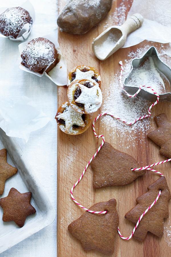 Nut And Date Muffins, Mince Pies And Gingerbread Shapes Photograph by Sjoberg, Marie