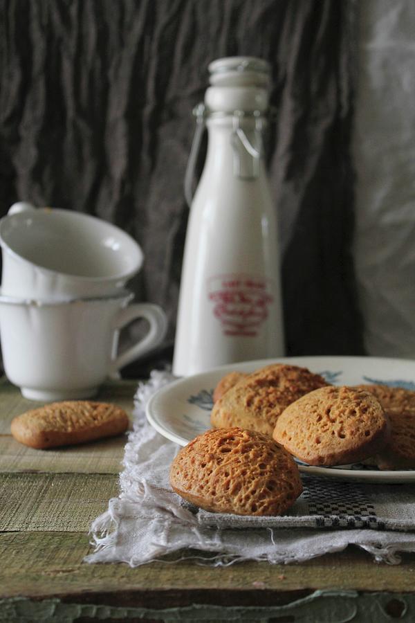 Nut Biscuits On A Plate In Front Of Two Coffee Cups Photograph by Patricia Miceli
