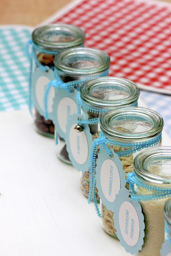 Nuts, Seeds & Dried Fruits In Storage Jars With Hand-crafted Labels Photograph by Ruth Laing