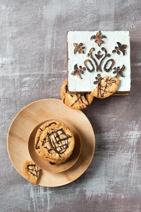 Oat Biscuits With Chocolate And A Wooden Box Photograph by Mandy Reschke