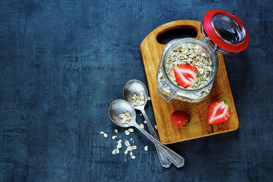 Oat Flakes In Gar With Fresh Strawberries For Breakfast On Dark Vintage Background Photograph by Yuliya Gontar