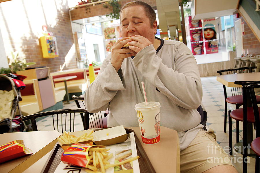 Obese Man Eating Photograph by Michael Donne/science Photo Library
