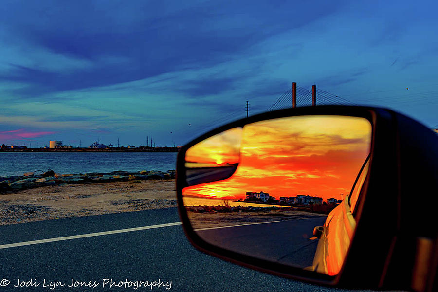 Objects in mirror are closer than they appear Photograph by Jodi Lyn Jones