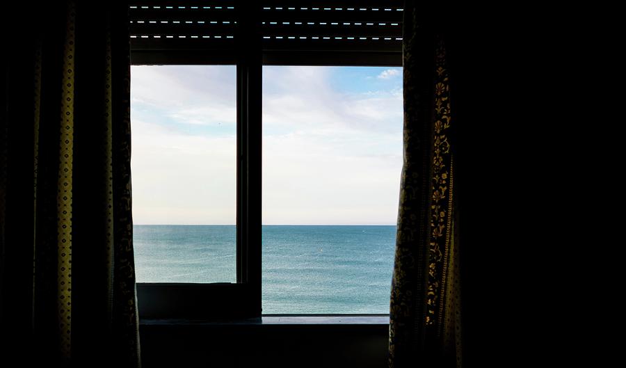 Ocean Seen Through A Window With Roller Photograph by Edpics - Fine Art ...