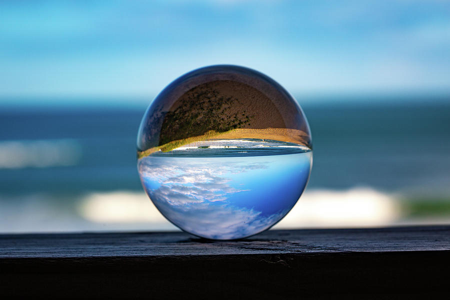 Ocean Through the Lens Ball Photograph by Lora J Wilson