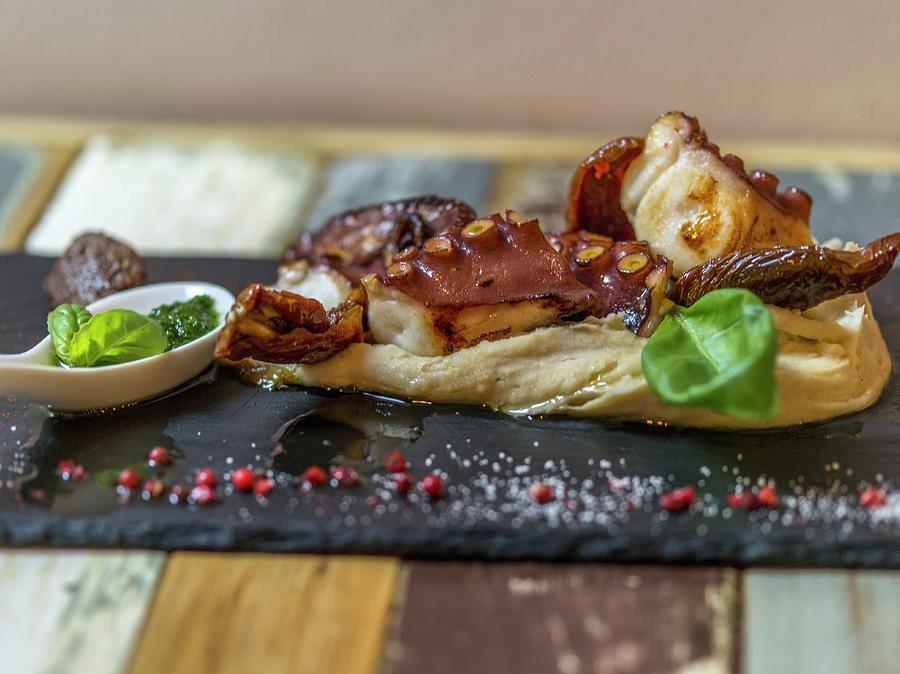 Octopus On A Bed Of Polenta With Basil Pesto Photograph by Manuel Krug