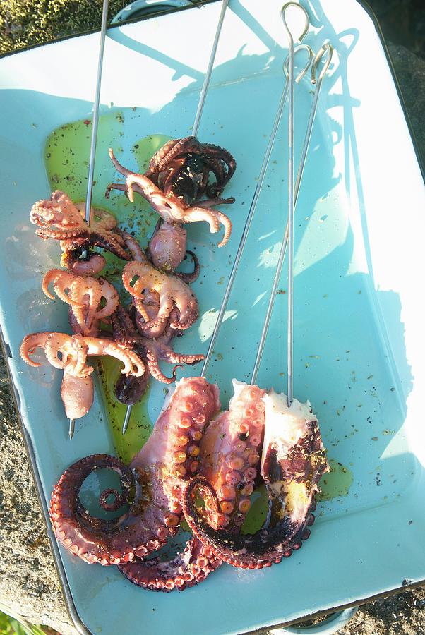 Octopus Skewers Ready To Grill Photograph by Spyros Bourboulis