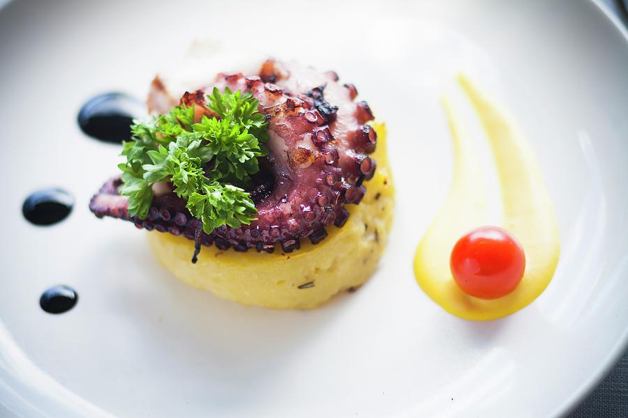 Octopus With Roasted Potatoes And Balsamic Vinegar Photograph by Imagerie