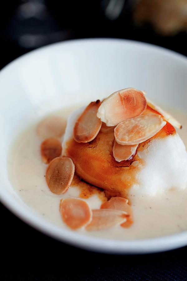 Oeufs A La Neige floating Islands Vanilla Creme Anglaise, Poached Meringue, Caramel, Toasted Almonds Photograph by Harley, Victoria
